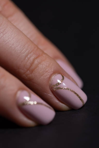 human hands with manicure on black background - nails art stock pictures, royalty-free photos & images