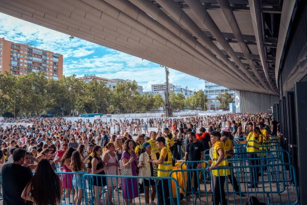 Hundreds of fans queue to enter the concert in the vicinity of the Santiago Bernabeu Stadium, before the second concert of Taylor Swift, on 30 May,...