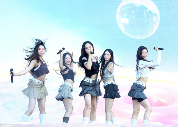 Hyein, Hanni, Minji, Haerin and Danielle of NewJeans perform in concert during Lollapalooza at Grant Park on August 03, 2023 in Chicago, Illinois.