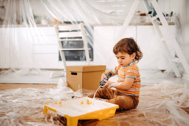 i'm helping dad - home decoration stock pictures, royalty-free photos & images