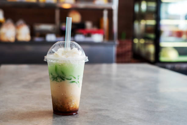 ice cendol in a plastic cup - junk food stock pictures, royalty-free photos & images