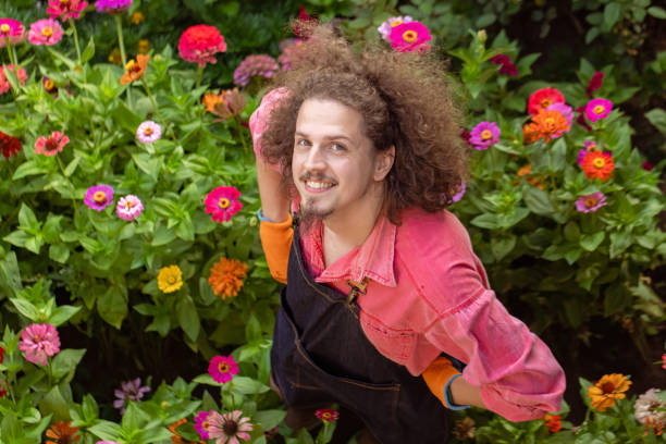 if you need to take care of flowers, call me! - garden decoration stock pictures, royalty-free photos & images