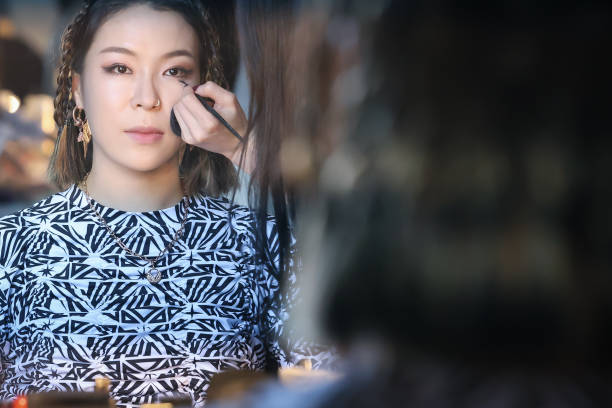 In this image released on March 23, Choi Hyojin from female K-pop dance crew "Want" is seen in the backstage before a prerecorded finale concert as a...