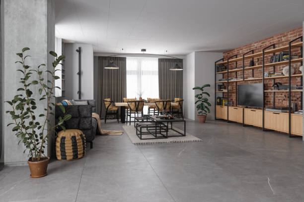 industrial style living room with sofa, dining table, chairs, television set and brick wall - home decoration stock pictures, royalty-free photos & images