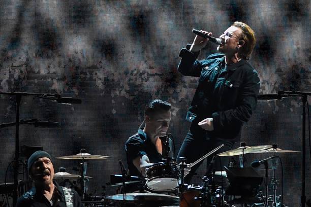 Irish rock band U2 perform during a concert at the D.Y. Patil stadium in Navi Mumbai on December 15, 2019.