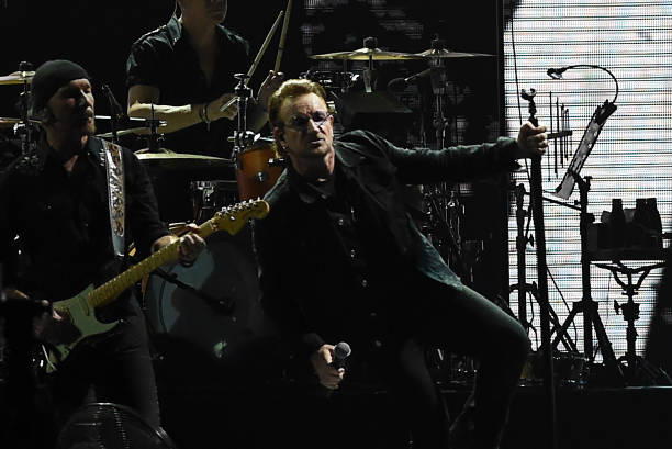 Irish rock band U2 singer Bono performs during a concert at the D.Y. Patil stadium in Navi Mumbai on December 15, 2019.