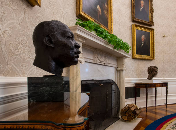 January 20: A sculpted bust of Dr. Martin Luther King, Jr., adorns a table for an early preview of the redesigned Oval Office awaiting President...
