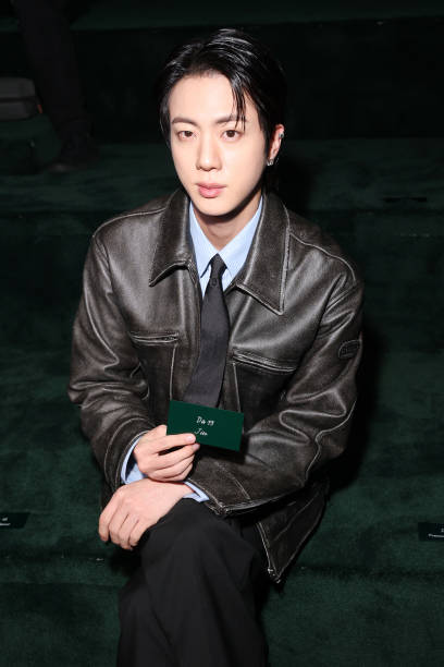 Jin attends the Gucci - Women's Fall/Winter 2025/2026 Fashion Show during the Milan Fashion Week Womenswear Fall/Winter 2025/2026 on February 25,...
