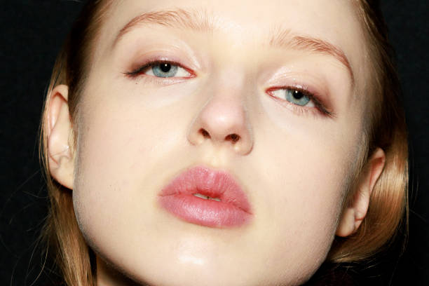 Kajsa Nasiell Nauckhoff, make up detail poses backstage ahead of the Ermanno Scervino fashion show during the Milan Fashion Week Womenswear...