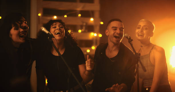karaoke nights are their thing - concert stock pictures, royalty-free photos & images