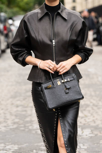 Kelsey Merritt wears Hermes outside the Hermes show during Womenswear Spring/Summer 2025 as part of Paris Fashion Week on September 28, 2024 in...