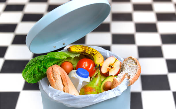 kitchen bin with out of date food - food stock pictures, royalty-free photos & images