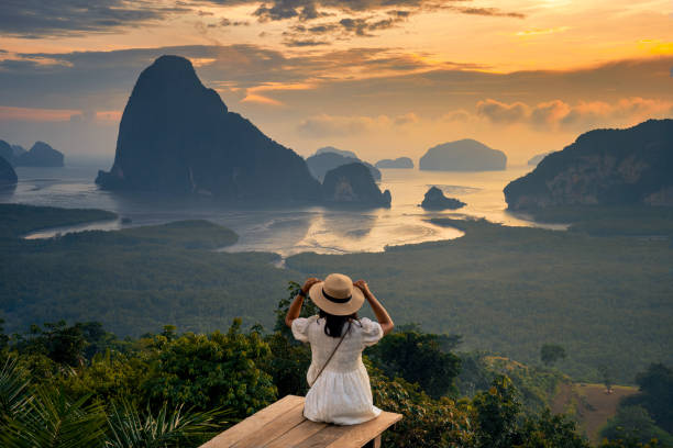 landscape of limestone karsts in phang nga bay at sunrise. unseen place of "samed nangshe" or "samet nangchee" in phang nga province, thailand. - travel stock pictures, royalty-free photos & images