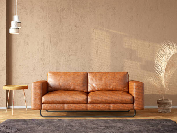 leather sofa with an empty beige wall for mockup - home decoration stock pictures, royalty-free photos & images
