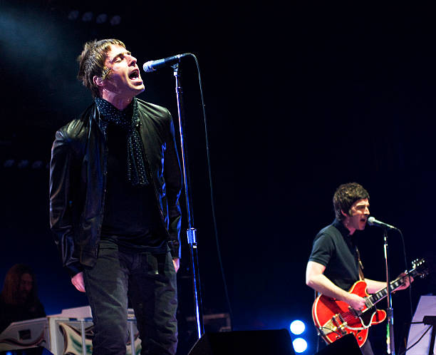Liam and Noel Gallagher from English rock band Oasis, live on stage at Wembley Arena, London, October 16, 2008.