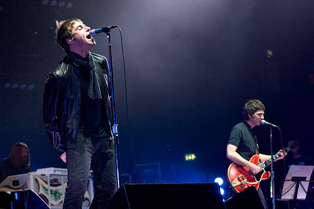 Liam Gallagher and Noel Gallagher of English rock band Oasis, live on stage at the Wembley Arena, October 16, 2008.