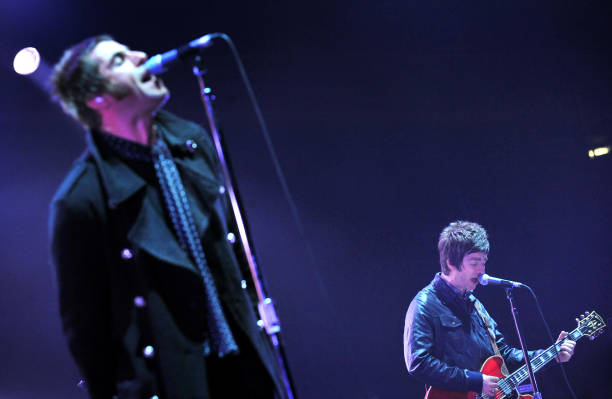 Liam Gallagher and Noel Gallagher of Oasis performing at Vorst Nationaal, Brussels, Belgium, 13th January 2009.
