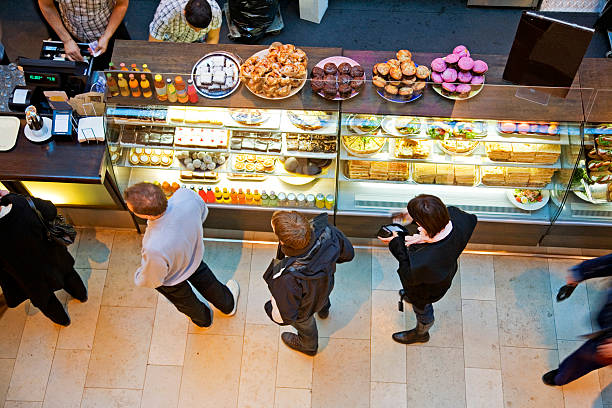 lining up at cafe' with tasty pastry for a snack. - junk food stock pictures, royalty-free photos & images