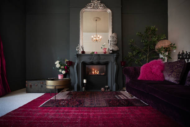 living room with dark walls and authentic fireplace - home decoration stock pictures, royalty-free photos & images