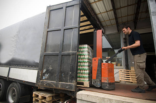 loading a truck - food stock pictures, royalty-free photos & images