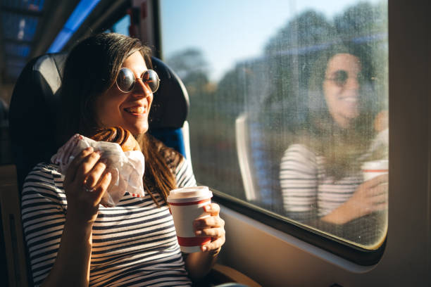 looking through window on a train ride - junk food stock pictures, royalty-free photos & images