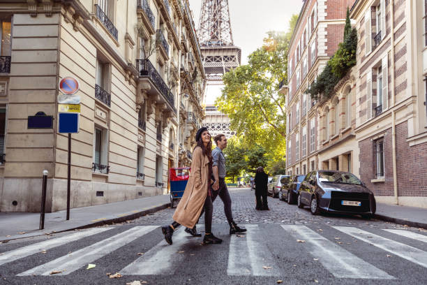 lovely couple spending some days in vacation to paris - travel stock pictures, royalty-free photos & images