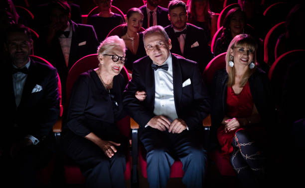 loving senior couple watching opera together - concert stock pictures, royalty-free photos & images