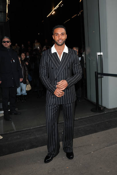Lucien Laviscount arrives at the Dolce & Gabbana fashion show during the Milan Menswear Fall/Winter 2025 - 2026 Fashion Week on January 18, 2025 in...