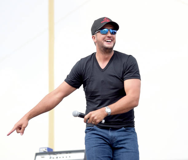 Luke Bryan surprises fans with tickets to his concert tonight at Nissan stadium during the 2018 CMA Music festival at the Chevy Riverfront Stage on...