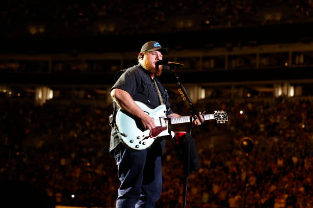 Luke Combs performs onstage at the Concert For Carolina Benefit Concert at Bank of America Stadium on October 26, 2024 in Charlotte, North Carolina.