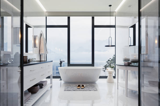 luxury bathroom interior with hot tub and beautiful sea view - home decoration stock pictures, royalty-free photos & images