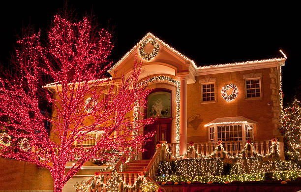luxury home with christmas lights at night, brooklyn, new york. - garden decoration stock pictures, royalty-free photos & images