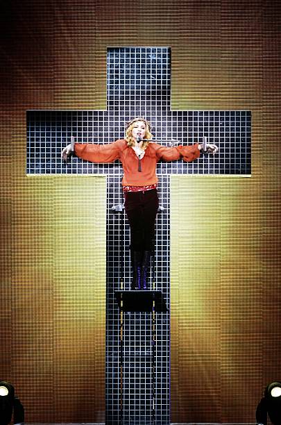 Madonna performs onstage at the first London concert of her "Confessions" World Tour at Wembley Arena August 1, 2006 in London, England.
