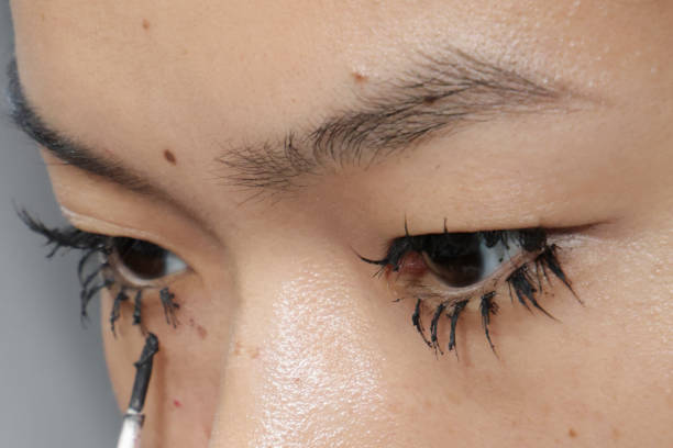 Make up artist does the final touch is seen backstage at the Fiorucci fashion show during the Milan Womenswear Spring/Summer 2025 on September 17,...