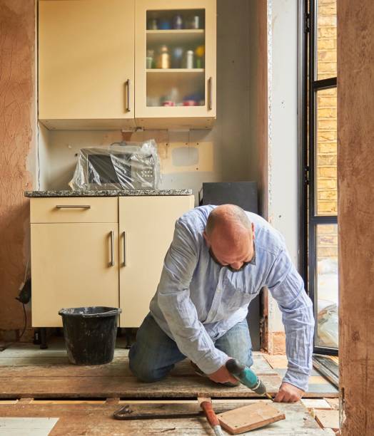 man doing diy at home - home decoration stock pictures, royalty-free photos & images