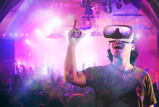 man enjoying a club night in a virtual reality - concert stock pictures, royalty-free photos & images