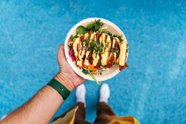 man holding wooden plate with tonkatsu, directly above view - food stock pictures, royalty-free photos & images