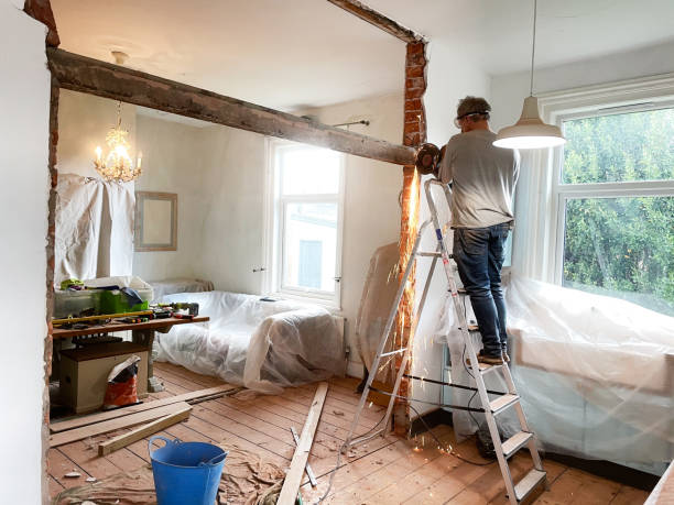man removing a metal beam - home decoration stock pictures, royalty-free photos & images
