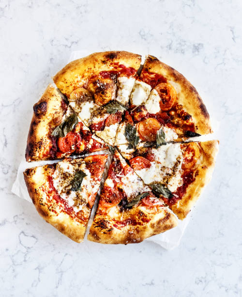 margherita pizza on white background - junk food stock pictures, royalty-free photos & images