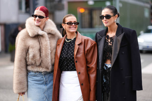 Marianne Theodorsen, Janka Polliani and Darja Barannik are posing, outside The Garment, during the Copenhagen Fashion Week AW24 on January 31, 2024...