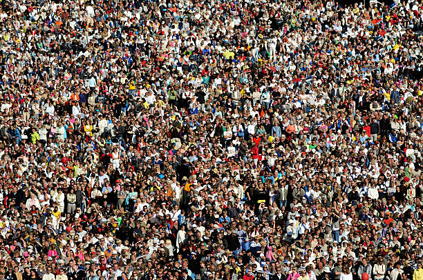 massive amount of people - concert stock pictures, royalty-free photos & images
