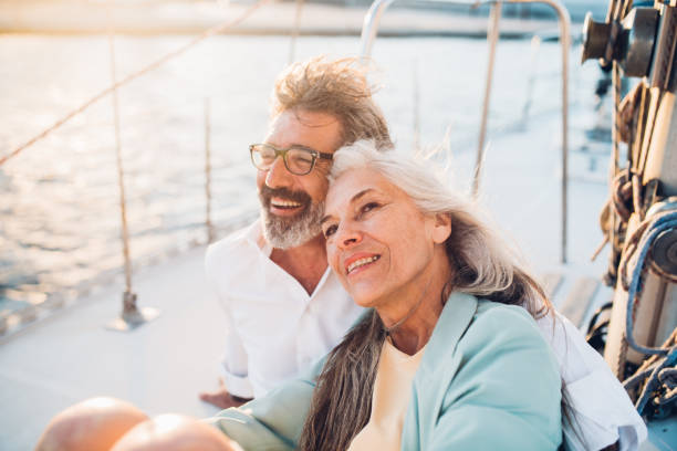 mature couple smiling - travel stock pictures, royalty-free photos & images