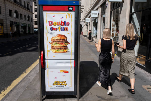 McDonalds Double Big Mac with Bacon beef burger advertising poster with the tagline 'double the fun' on 29th July 2024 in London, United Kingdom....