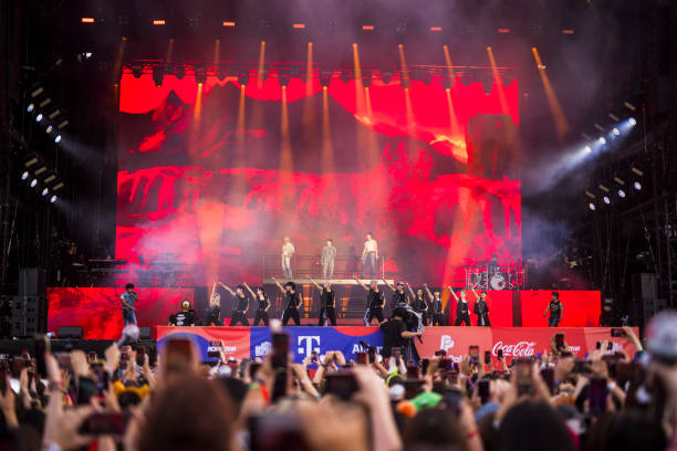 Members of the korean K-Pop band Seventeen perform live on stage during a concert during day 2 of Lollapalooza 2024 at Olympic Stadium on September...