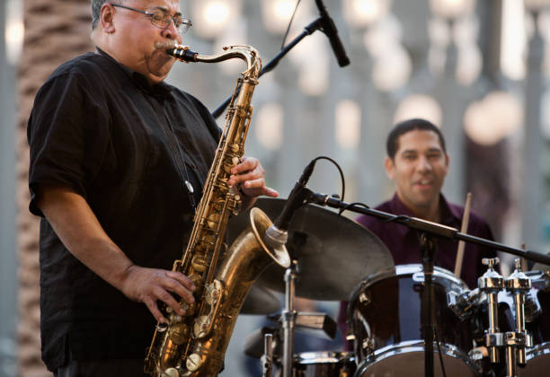 men playing in jazz band - concert stock pictures, royalty-free photos & images