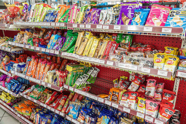 Merida, Mexico, Zona Paseo Montejo Centro, Oxxo convenience store, junk food candies cookies.