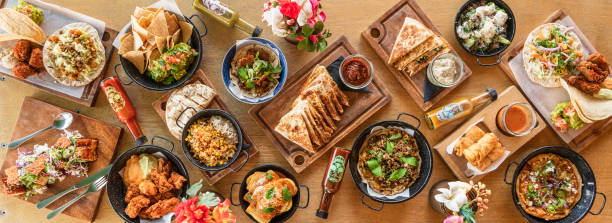mexican food table spread. - food stock pictures, royalty-free photos & images