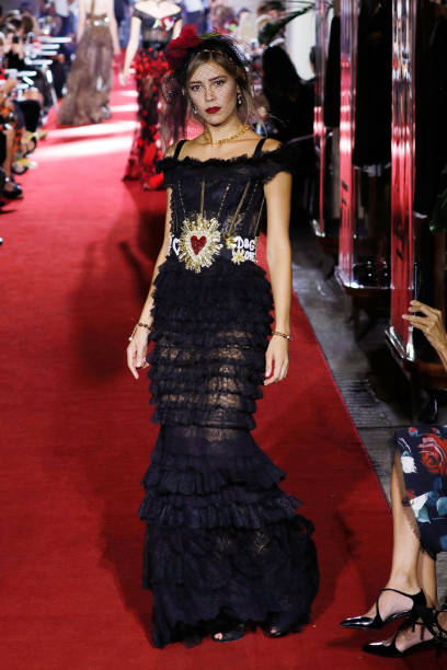 Michelle Salas walks the runway at the Dolce & Gabbana secret show during Milan Fashion Week Spring/Summer 2018 at Bar Martini on September 23, 2017...