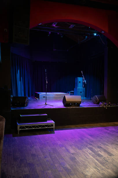 microphones and amps on stage - concert stock pictures, royalty-free photos & images