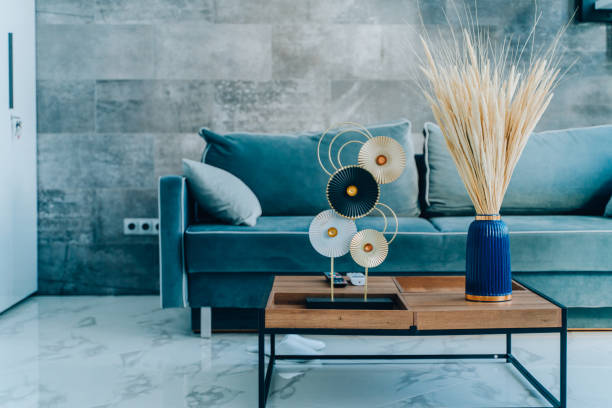 minimalistic design interior of living space. cozy living room with blue sofa and pampas decoration. - home decoration photos et images de collection